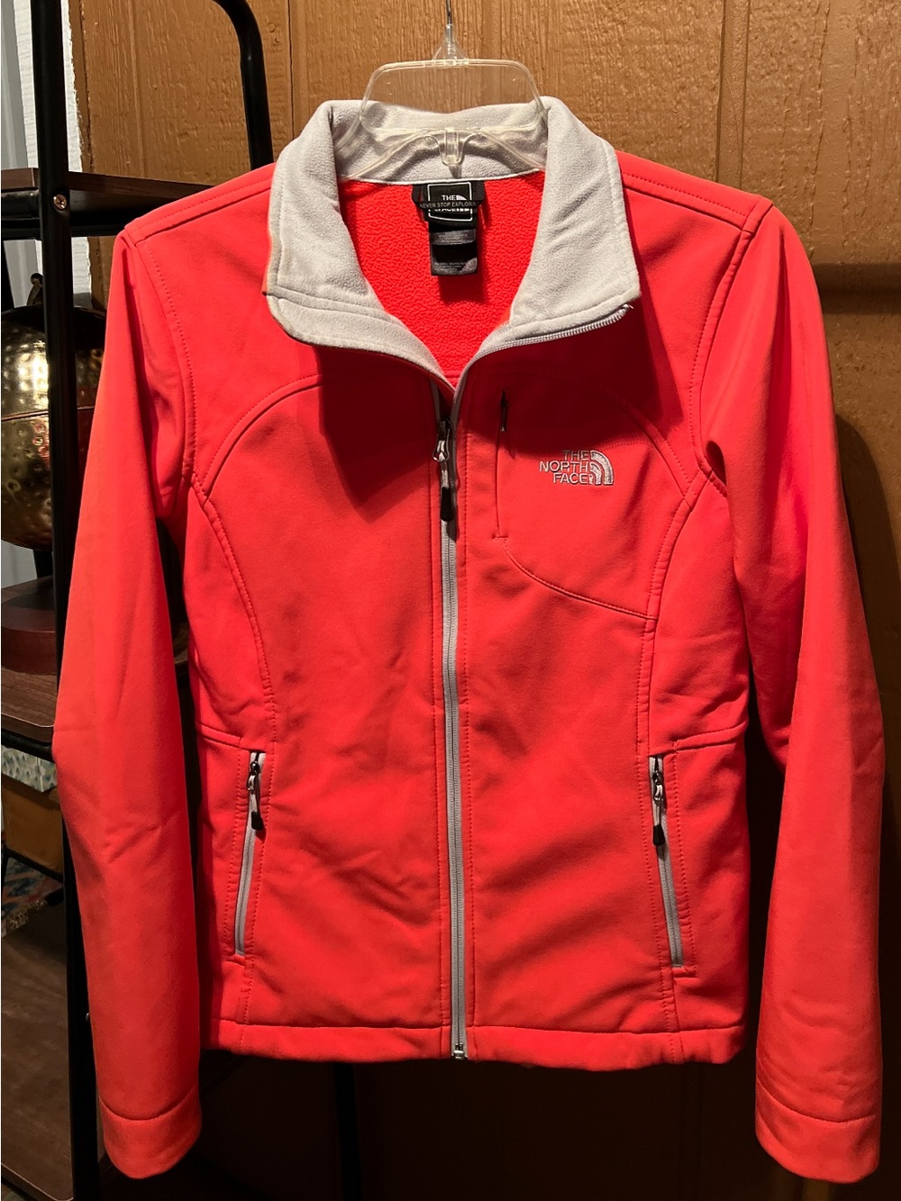 The North Face Women’s Coral-Red Softshell Jacket with Light Gray Trim